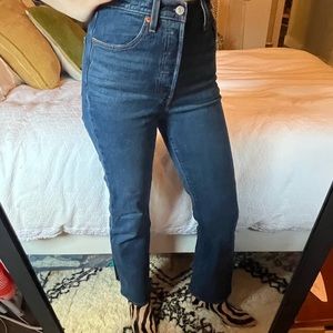 Barely worn! Levi’s ribcage boot cut jeans in dark blue wash.